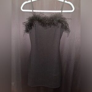 Black body-con dress. Size S. NEVER WORN